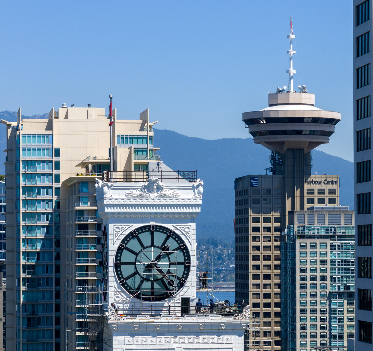 Aerial panorama of Vancouver Block during the 2024 clock tower restoration showing scaffolding and surrounding cityscape